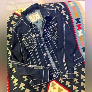 True Religion Jimmy Super T denim in a dark wash with white contrast stitching